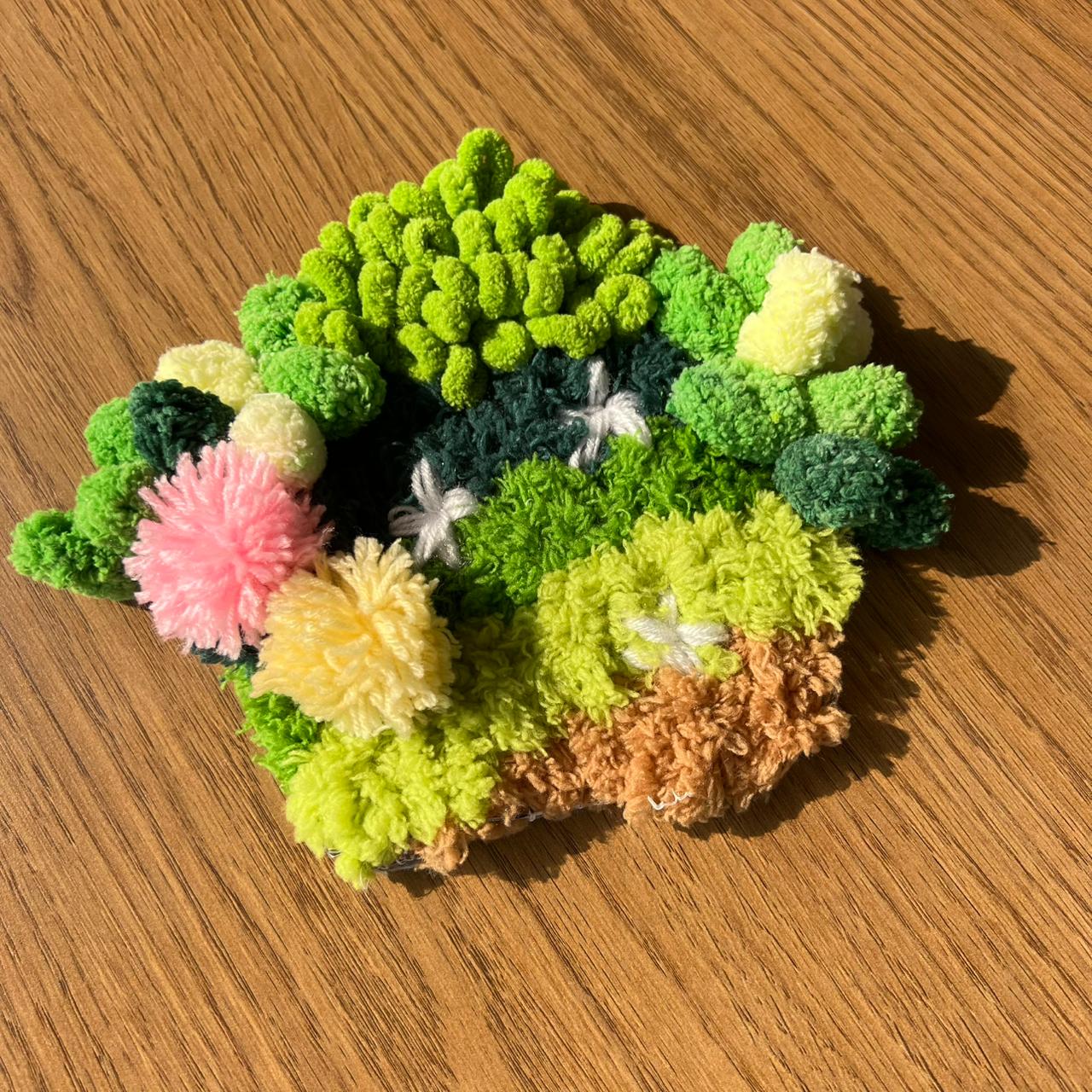 Moss Muse DIY moss coaster kit with green textured yarn and canvas. Beginner friendly DIY craft kit.