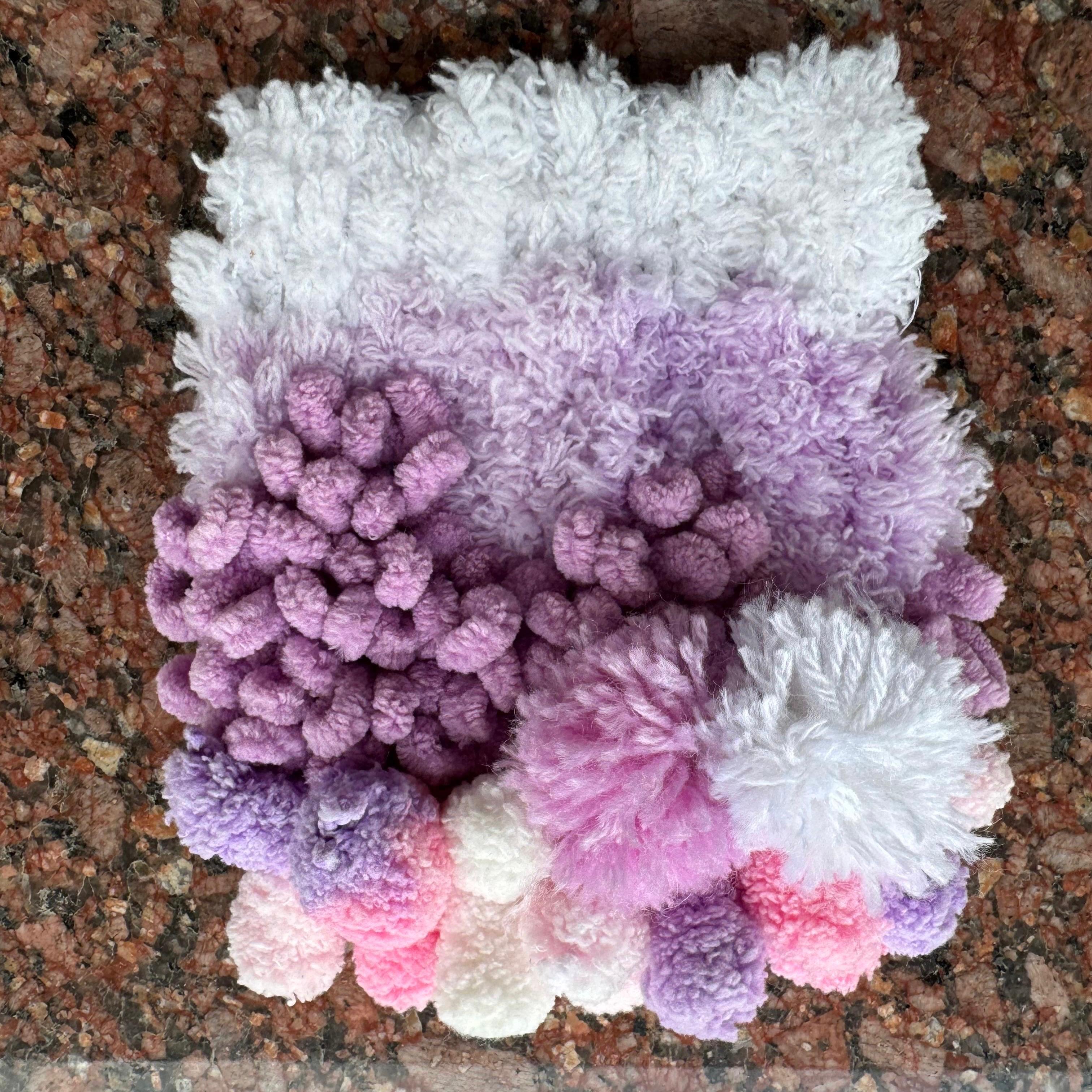 Soft white fades into lilac and dusty purple, finished with a flurry of pastel pom-poms in blush pink, lavender, and cream. Taro Boba is Monsoon Magic's dreamier cousin — inspired by that milky purple boba swirl, it's soft, sweet, and made for anyone who wants their coaster to look good enough to sip.